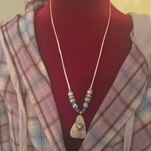 Homemade stone necklace.